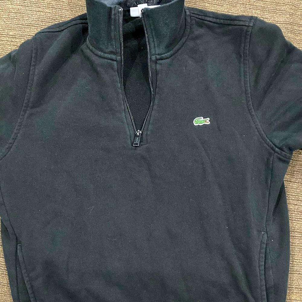 Worn, no tears. Good condition. Black